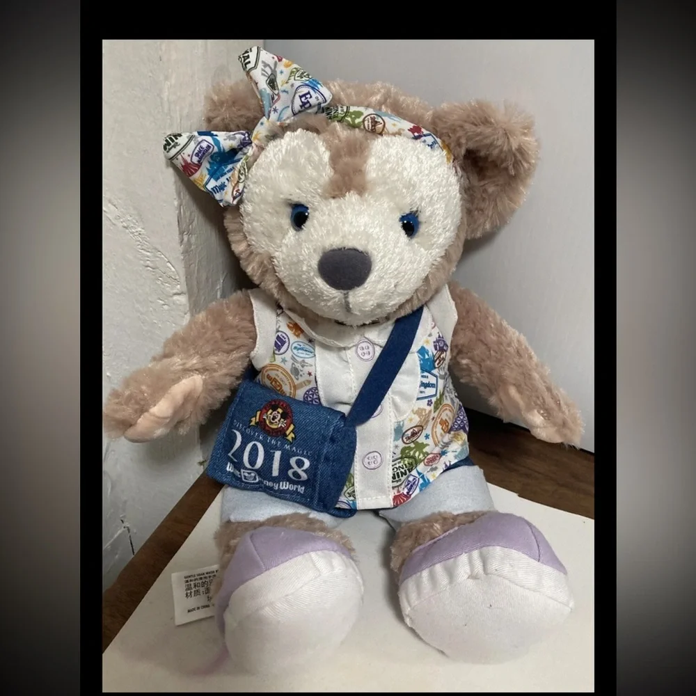 Disney Duffy Bear Plush with Blue Bag and Patterned Outfit